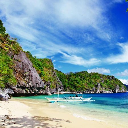 Mbg Travellers Inn Powered By Cocotel Puerto Princesa Buitenkant foto