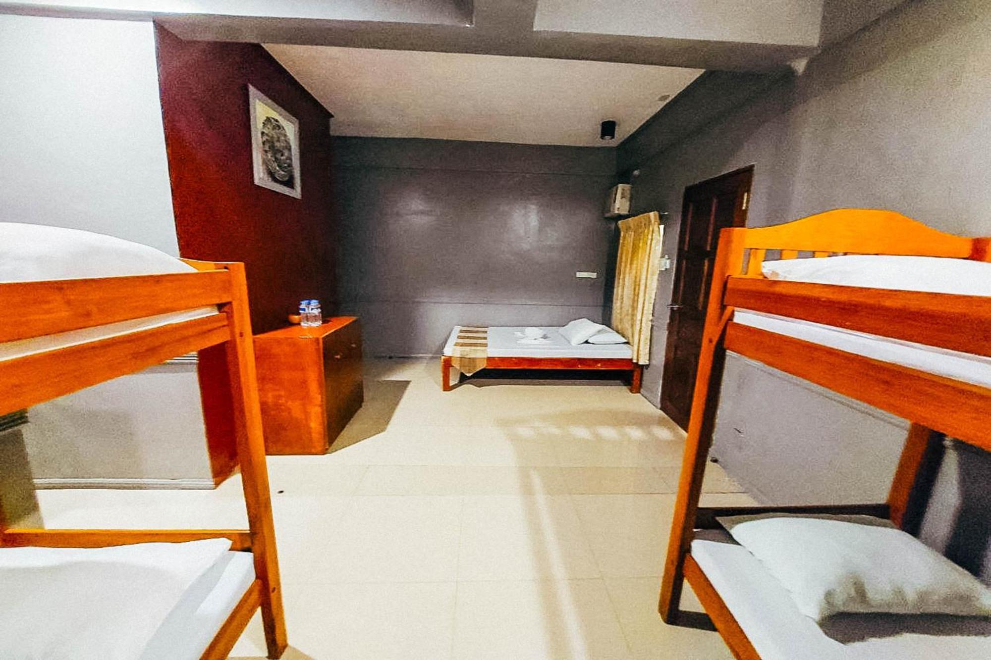 Mbg Travellers Inn Powered By Cocotel Puerto Princesa Kamer foto