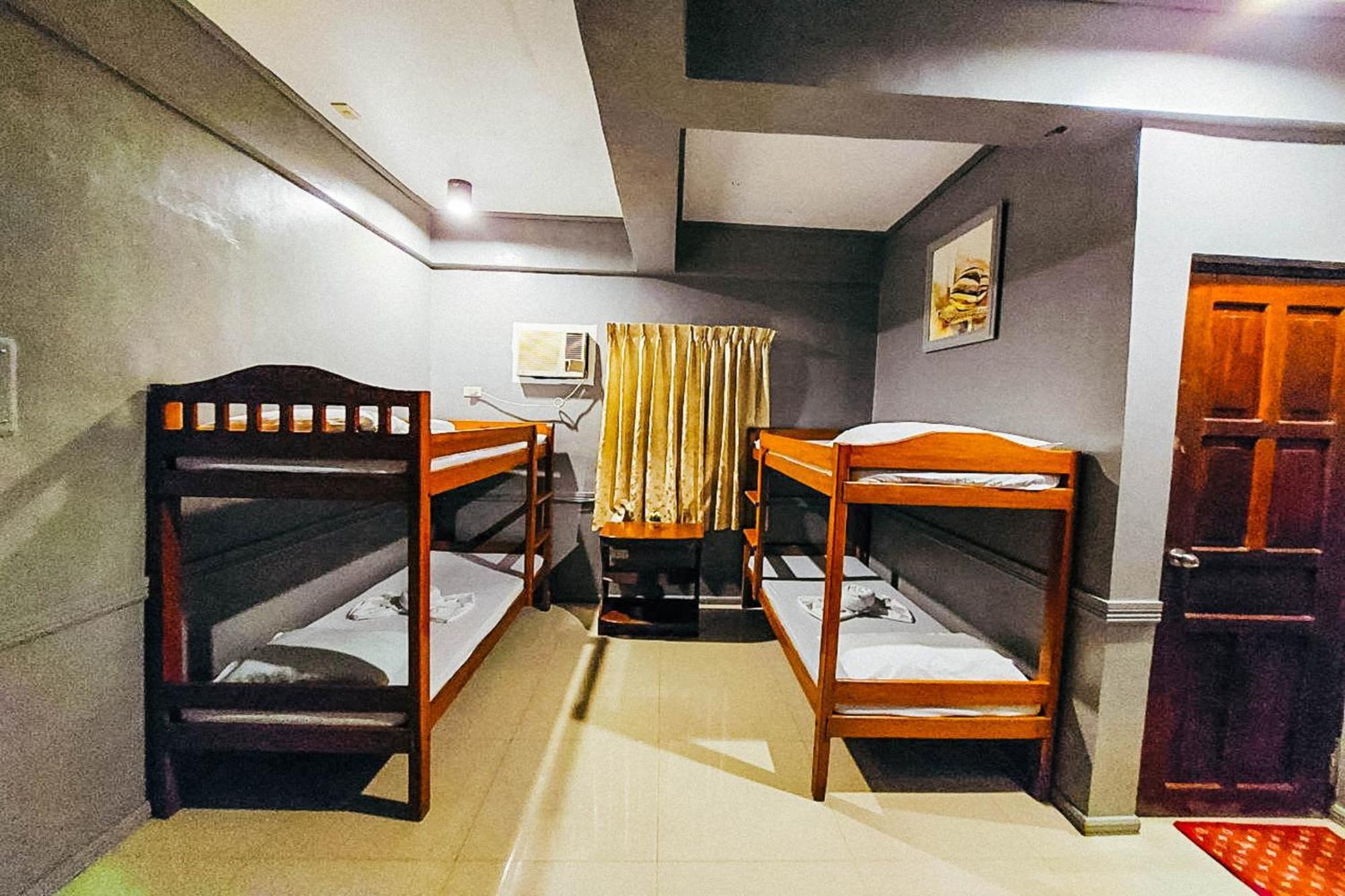 Mbg Travellers Inn Powered By Cocotel Puerto Princesa Kamer foto