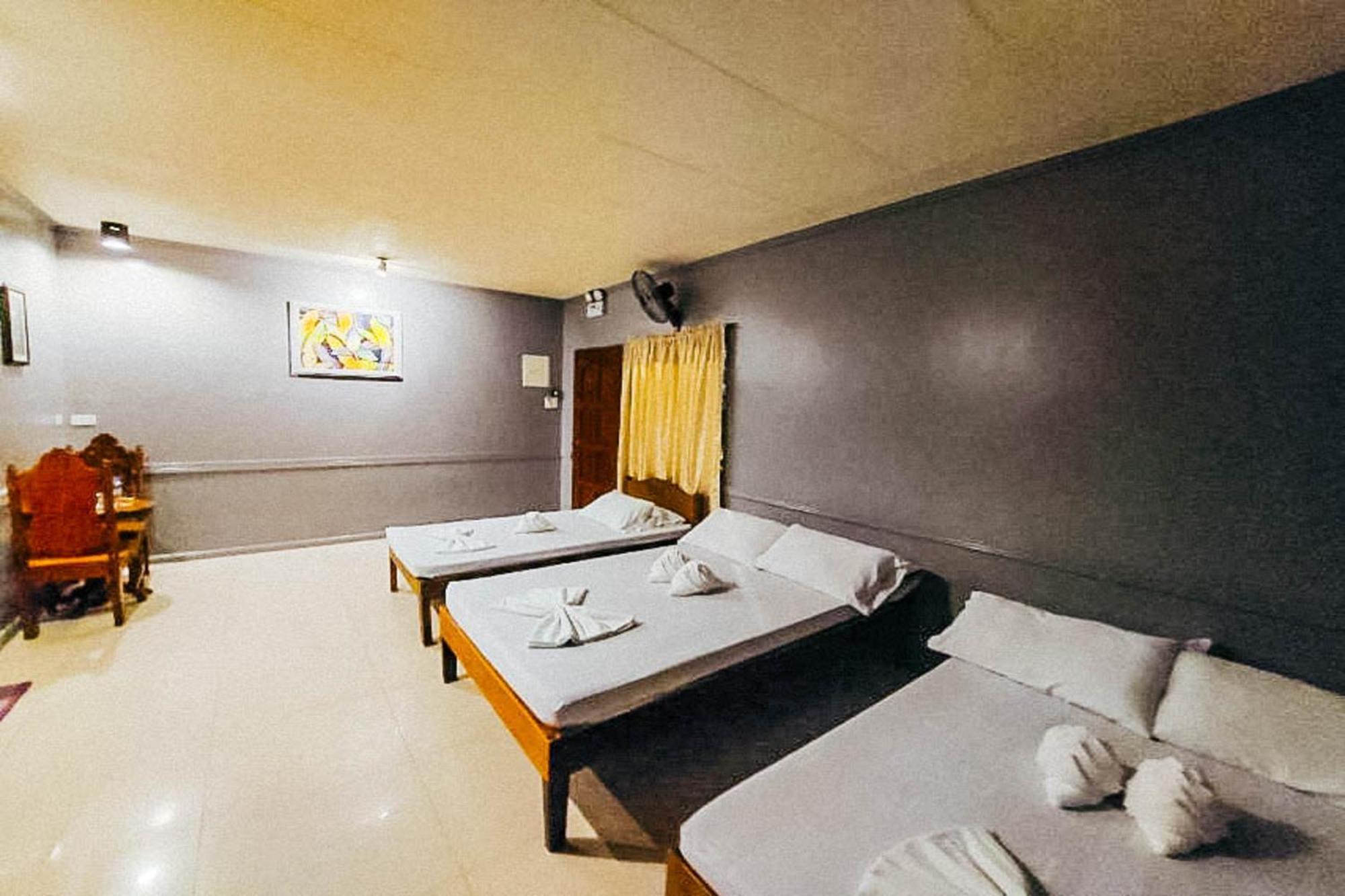 Mbg Travellers Inn Powered By Cocotel Puerto Princesa Kamer foto