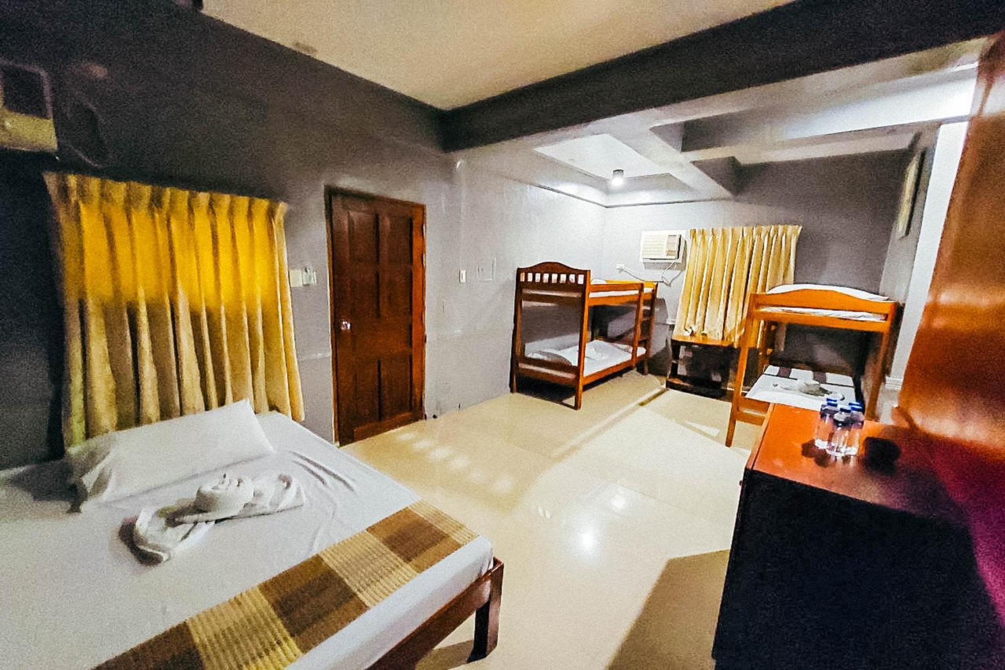 Mbg Travellers Inn Powered By Cocotel Puerto Princesa Kamer foto