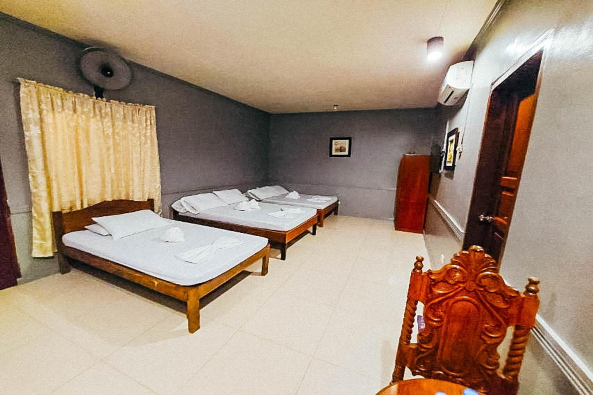 Mbg Travellers Inn Powered By Cocotel Puerto Princesa Kamer foto