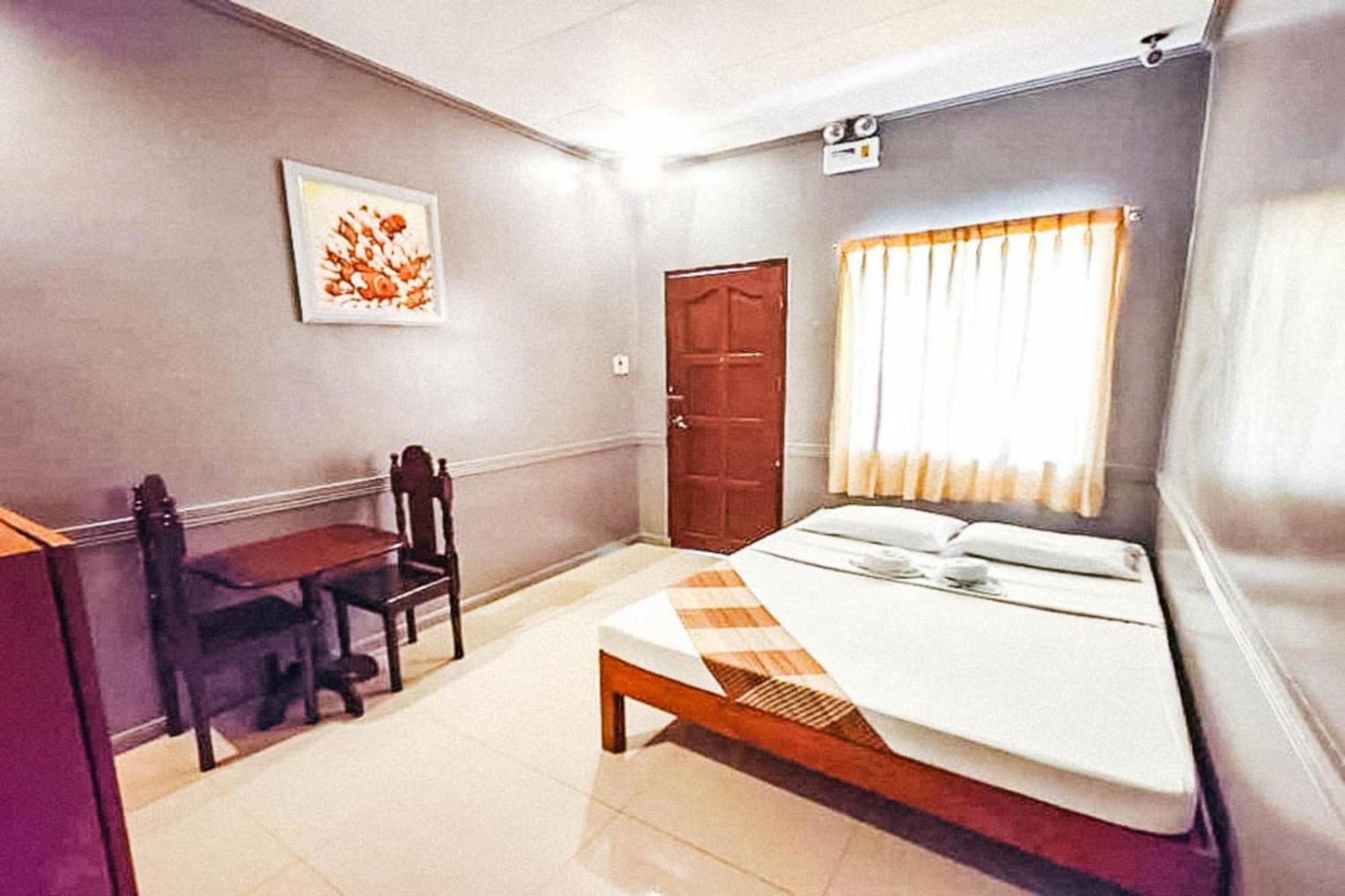 Mbg Travellers Inn Powered By Cocotel Puerto Princesa Kamer foto