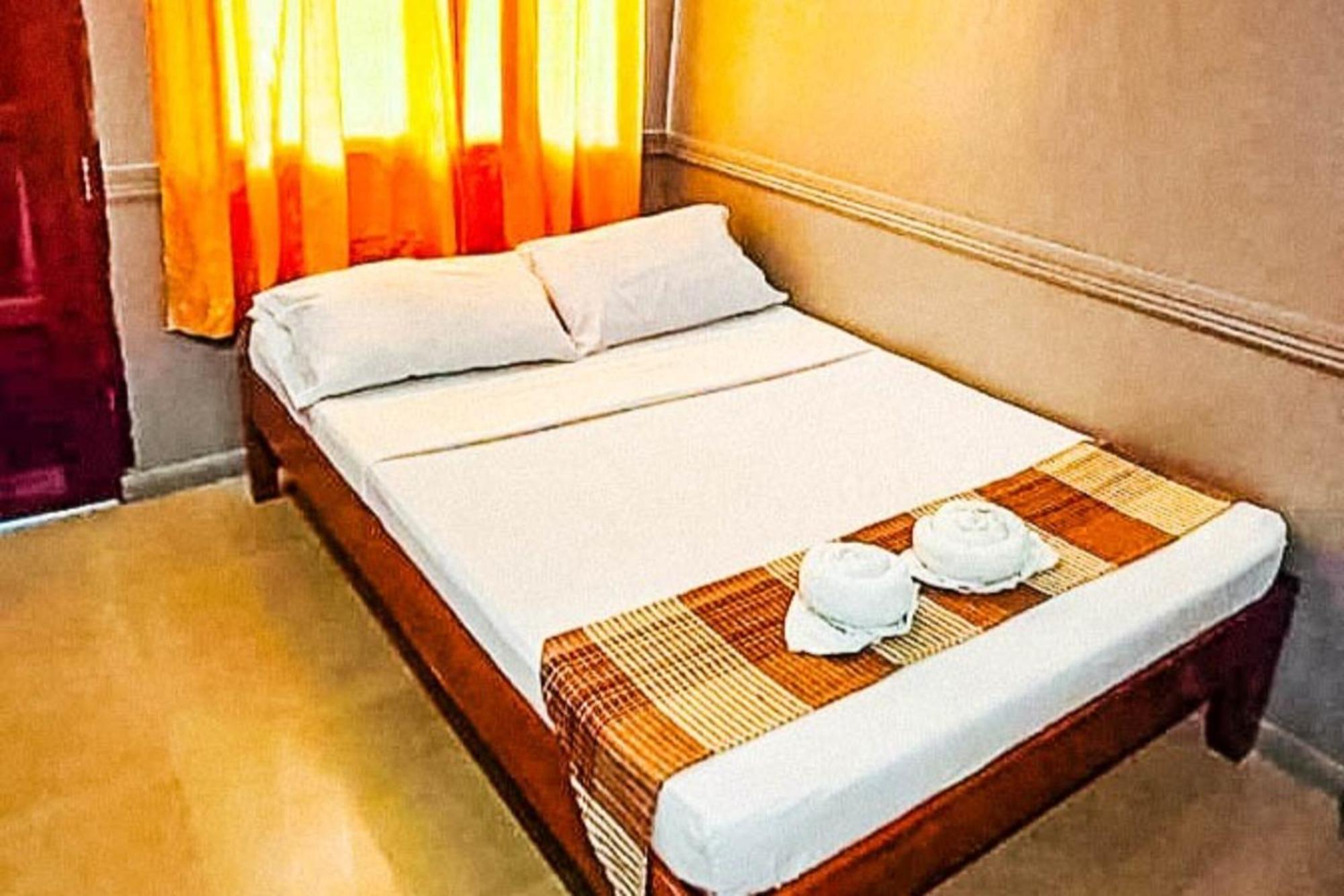 Mbg Travellers Inn Powered By Cocotel Puerto Princesa Kamer foto
