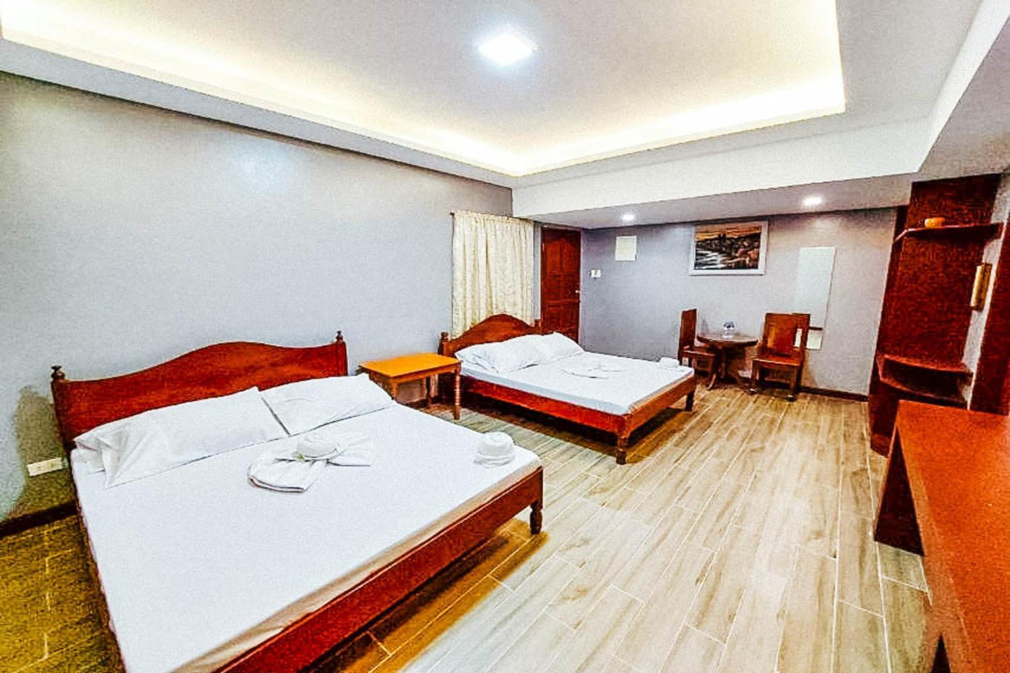 Mbg Travellers Inn Powered By Cocotel Puerto Princesa Kamer foto
