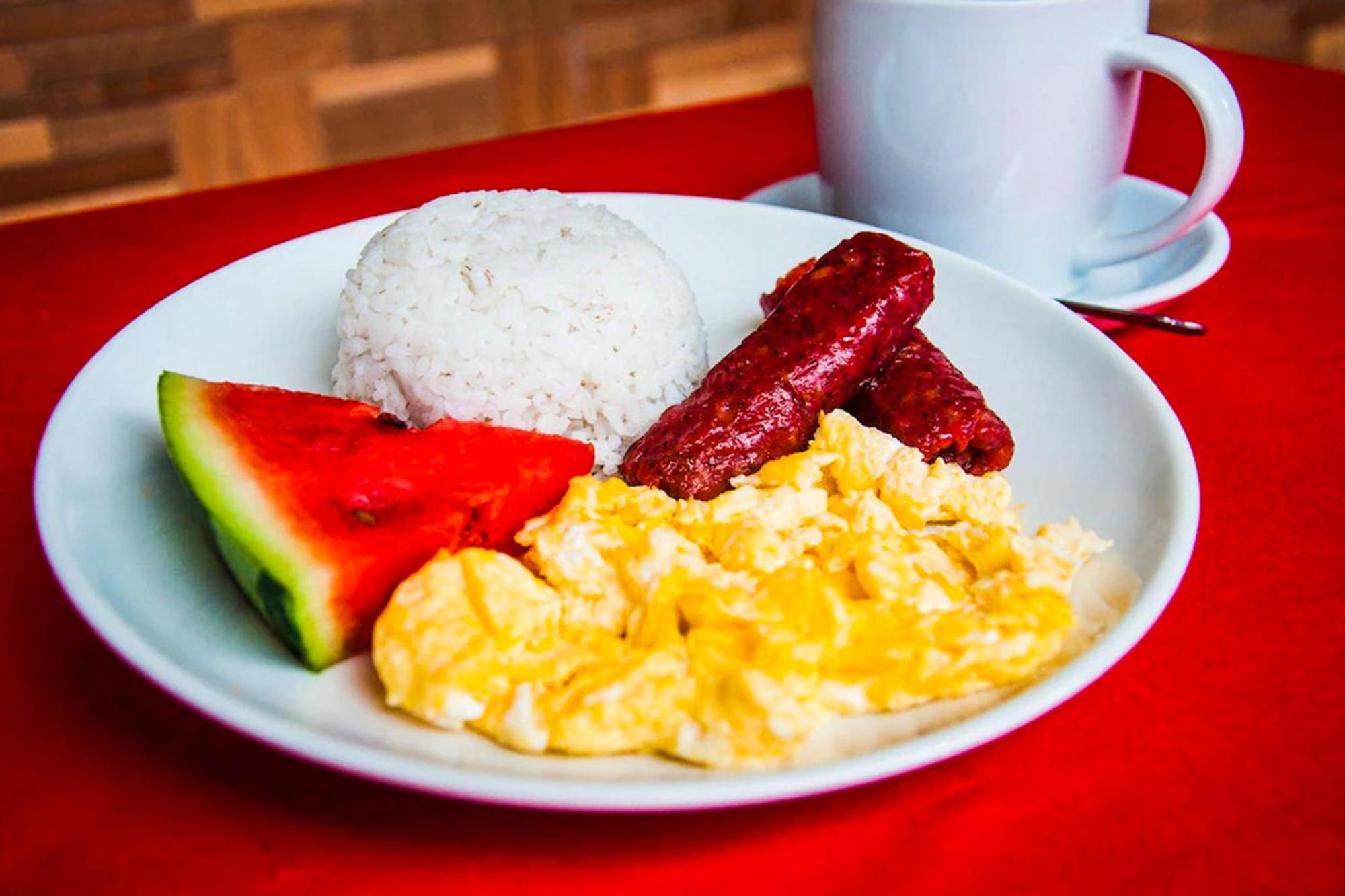 Mbg Travellers Inn Powered By Cocotel Puerto Princesa Buitenkant foto