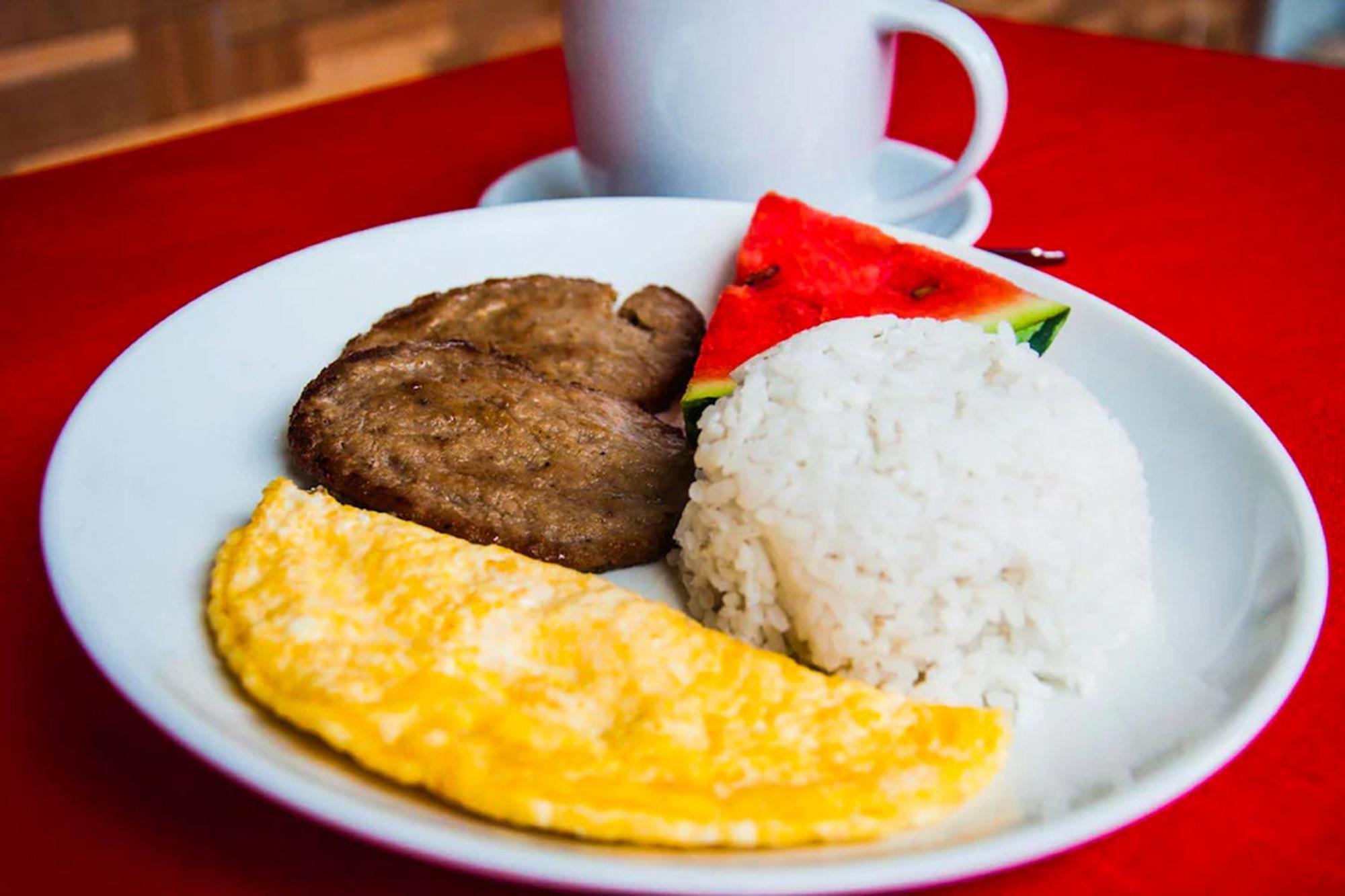 Mbg Travellers Inn Powered By Cocotel Puerto Princesa Buitenkant foto