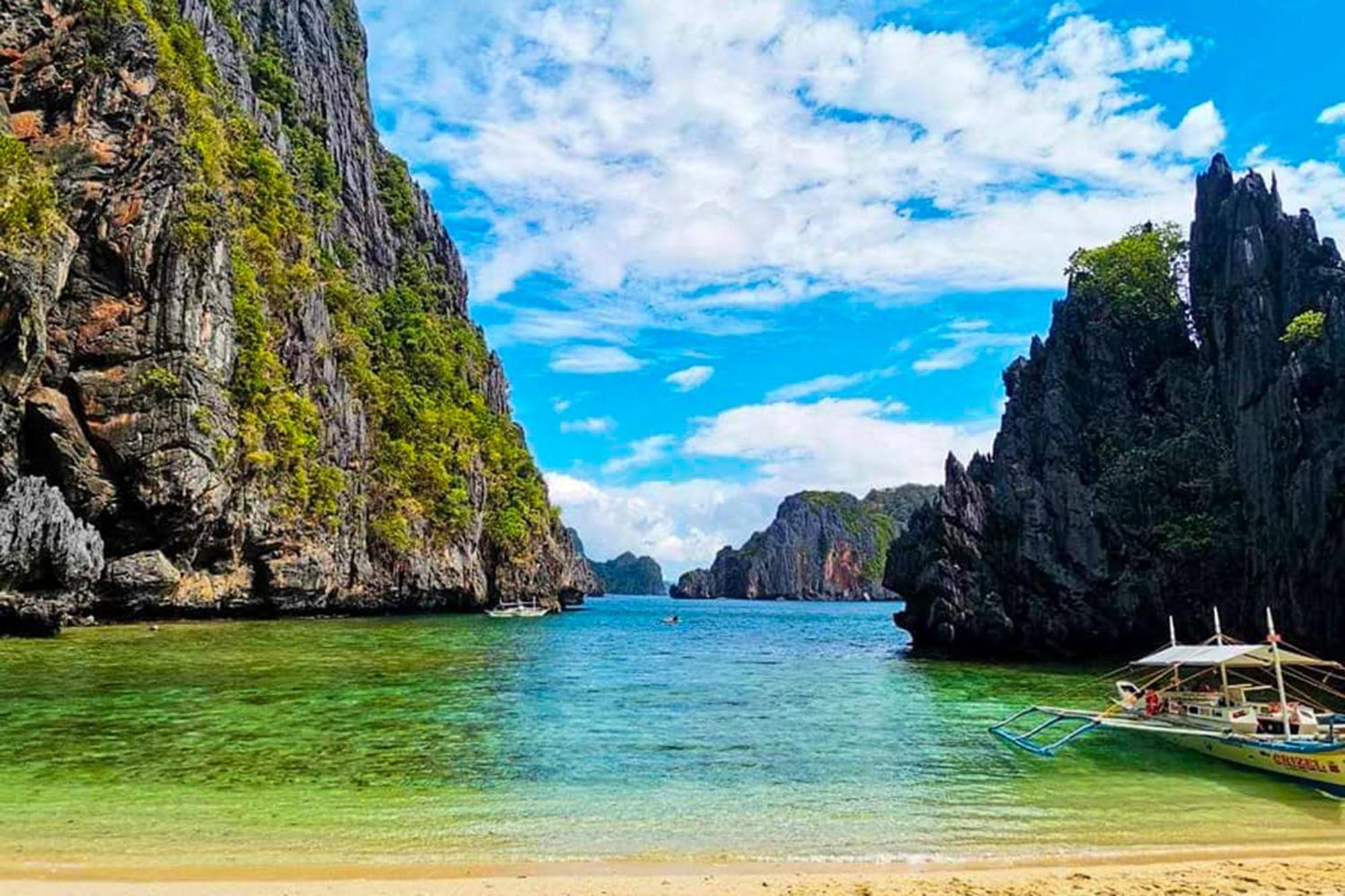 Mbg Travellers Inn Powered By Cocotel Puerto Princesa Buitenkant foto